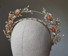 Bridal pearl crown, Elf tiara, Fairytale princess crown ~MATERIALS~ -Austrian crystals (color clear and blue) -Czech pearls and crystal beads -Peach color crystal beads -Gold tone filigree flowers ~SIZE~ Height 2 inch (5 cm) ~SHIPPING AND DELIVERY TIME~ This headpiece is ready to ship by 1-3 days The approximate time of shipment: - 10-16 days to Europe - 15-35 days to United States and other countries. ~IMPORTANT INFORMATION~ -Please allow as much time for shipping as possible before your import Elf Crown, Elf Tiara, Beaded Crown, Gold Tiara, Pearl Tiara, Headpiece Jewelry, Crystal Crown, Princess Crown, Gold Crown