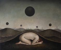 a painting of a person laying on the ground in front of mountains, with two black circles above them