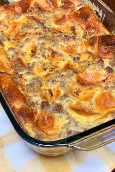 a casserole dish with sausage and cheese