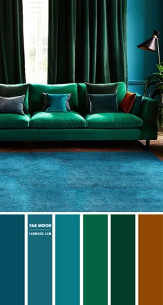 a living room with green couches, blue carpet and matching curtains in shades of teal