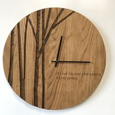 a wooden clock with the words it's not the time that matters is the person