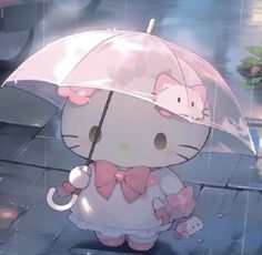 hello kitty holding an umbrella in the rain