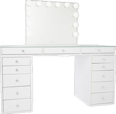 a white dressing table with drawers and a large mirror on the wall above it,