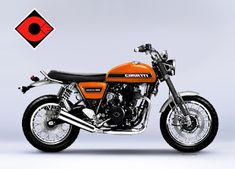 an orange and black motorcycle is parked in front of a red diamond logo on a gray background