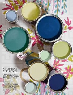 a magazine page with several different colors of paint in the same pans on it