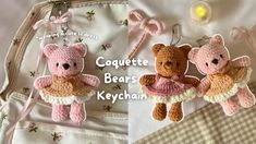 two crocheted teddy bears are hanging from a handbag, and one is holding a stuffed bear