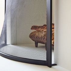 a close up of a microwave oven with bread in it's back door window