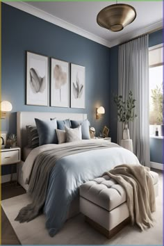 a bedroom with blue walls, white bedding and two framed pictures on the wall