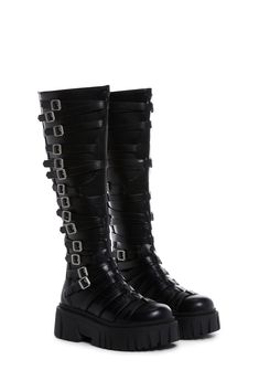 in a vegan leather construction. These knee high boots have decorative buckles on both sides, treaded soles, and back zipper closures. Thigh High Purple Boots, Black Punk Knee-high Boots With Buckle, Black Punk Style Knee-high Boots With Buckle, Black Punk Knee-high Boots With Buckle Closure, Gothic Leather Knee-high Boots, Gothic Leather Knee-high Boots For Alternative Fashion, Edgy Knee-high Boots With Buckle Closure, Punk Style Leather Knee-high Boots With Buckle, Alternative Leather Knee-high Combat Boots