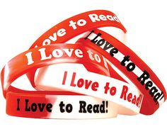 red and white wristbands with i love to read on them