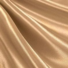 This 2 Way Stretch charmeuse satin its super soft and silky to the touch. The fabric is perfect for Dresses. This satin is light weight and it flows real good and drapes nice. The satin feels real silky and like real silk but it's made up of polyester and spandex tread. This satin can be use for wedding dresses-Prom dresses-nightgowns- linings-decorations and much more --- Create an incredible fashion statement and wrap yourself in your own design. Length:36 inches Width:58-60 inches 95% polyest Pyjama Satin, Bridal Fabric, Beige Aesthetic, Formal Gowns, Satin Fabric, Silk Satin, Medium Weight, Night Gown, Fashion Statement