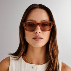 Featuring sweeping lines and refined proportions, our VELODROME sunglasses are an invariable classic. Designed with a midsized fit and chic signature pinstripe metal hardware on both temples, this refined cat-eye style is suitable for all face shapes and will look sharp with any outfit. Finished in a light vintage-toned tortoiseshell frame with flattering tonal lenses. Made using BPA free polymer plastic which is lightweight, durable and impact resistant Fitted with shatterproof and scratch resi Artsy Glasses, Coverup Swimsuit, Polymer Plastic, All Face Shapes, Le Specs, Romper Pants, Matching Dresses, Metal Hardware, Modern Fashion