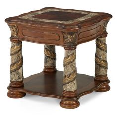 an ornate wooden table with marble top