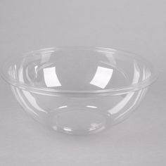 a clear plastic bowl on a white background