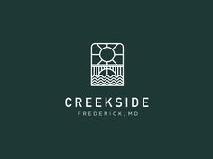 the logo for creekside, a residential development