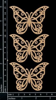 an image of a butterfly cutout on a black background with the measurements for each piece