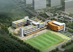 an aerial view of a soccer field and buildings