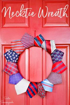 a red door with a wreath made out of ties on it and the words, patriotic necktie wreath