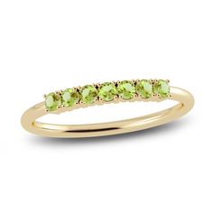 A playful balance between generous sparkle and minimal style, this gorgeous 10K yellow gold ring, adorned with shimmering natural peridot gemstones, makes the perfect gift (or keep for yourself). Substantial enough to wear on its own, or style comfortably stacked with other rings from your collection. From the Juliette Maison collection. Yellow Gold Peridot Stackable Rings, Elegant Peridot Stackable Rings For May Birthstone, Elegant Green Peridot Stackable Rings, Yellow Gold Peridot Stackable Rings For Anniversary, Yellow Gold Peridot Birthstone Ring, Yellow Gold Stackable Rings With Peridot, Push Gifts, Gold Book, Jared The Galleria Of Jewelry