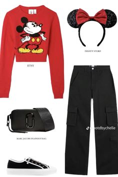 a red sweater and black pants with mickey mouse ears on top, white shoes and a handbag