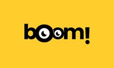 the word boom written in black and white on a yellow background with an eyeball