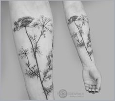 two tattoos that have flowers on them and one is in the middle of the arm