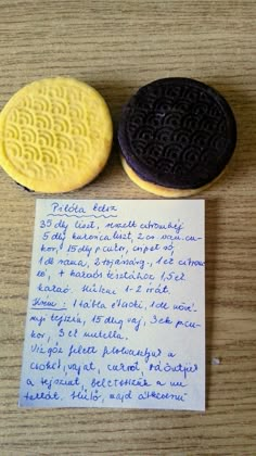 two cookies and a note on a table