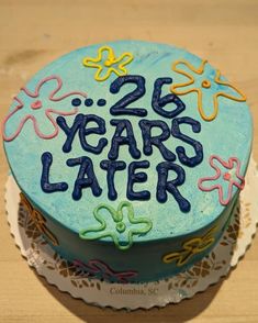 a cake that has the words 25 years later written on it and decorated with icing