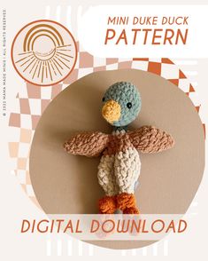 a crocheted stuffed bird sitting on top of a white and brown background with the words, mini duke duck pattern