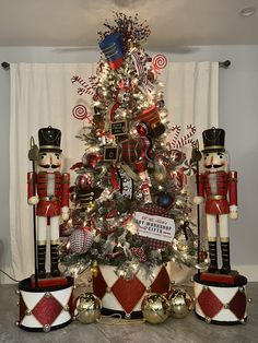 a christmas tree decorated with nutcrackers and decorations