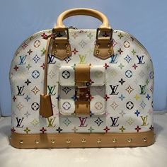 Louis Vuitton Alma Gm Multicolor White Hand Bag Size: 14 X 8 X 12 Authentic Louis Vuitton, Louis Vuitton Handbags, Classic Looks, Louis Vuitton Bag, Dust Bag, Satchel, Multi Color, Bag Lady, Louis Vuitton