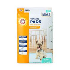 a pack of training pads for dogs with an image of a small dog on it