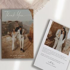 two wedding thank cards with an image of the bride and groom walking up a cliff