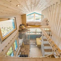 the inside of a tiny house with stairs