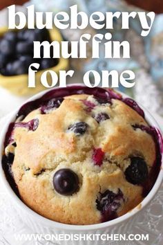 blueberry muffin for one in a white bowl with the title overlay reads, blueberry muffin for one