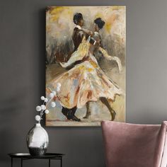 a painting hanging on the wall next to a chair