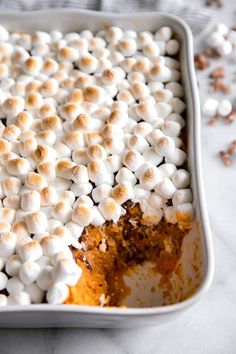 a casserole dish with marshmallows in it