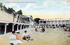 an old postcard shows people sitting on the beach in front of a building with several balconies