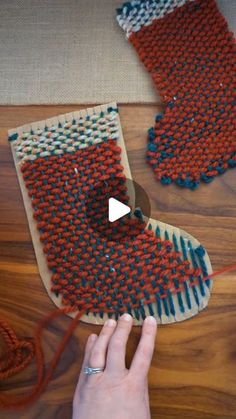 someone is working on some kind of weaving project