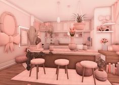 a pink kitchen filled with lots of furniture and decor