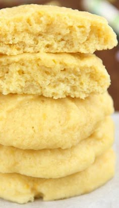 a stack of yellow cookies sitting on top of each other