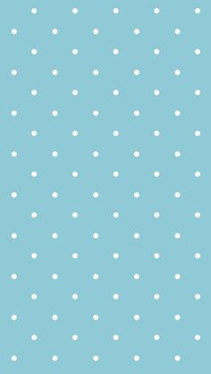 a blue background with white polka dots