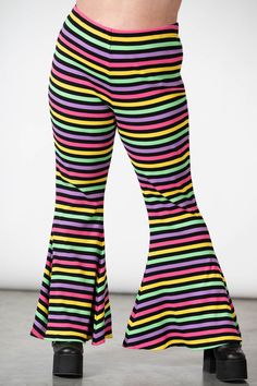 PRISMATIC.- Ribbed, thick, super stretch cotton fabric.- Statement stripe design.- Flared bottoms.- Elasticated waistband.- Fitted.Model is 5ft 7 and wears an 3XL.with KILLSTAR branding, 92% Cotton 8% Elastane. Plus Size Pastel Goth, Flared Bottoms, Pastel Goth Outfits, Top Clothing Brands, 2010 Fashion, Stretch Cotton Fabric, Pastel Stripes, Goth Outfits, Top Beauty Products