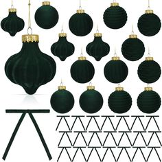 green christmas ornaments are hanging on clothes pins and hang from pegs to create an ornament