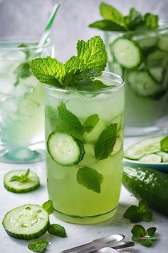 cucumber and mint mojita in glasses with spoons on the side