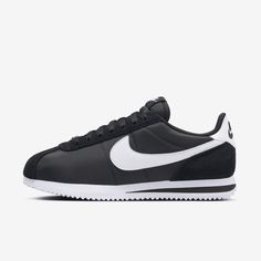 You spoke. We listened. Based on your feedback, we've revamped the original Cortez while maintaining the retro appeal you know and love. Now with a wider toe area and firmer side panels, you can comfortably wear them day in and day out. Plus, reengineered textile helps prevent warping or creasing. Cortez fans—this one’s for you. Nike Cortez Black, Nike Cortez Shoes, Cortez Shoes, Tenis Nike, Nike Models, Wide Width Shoes, Latest Sneakers, Nike Cortez, Work Boots