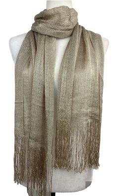 This versatile shimmery shiny shawl with fringe can be used to dress up an outfit for a special evening, a wedding or as a neck scarf in spring. Effortlessly give a dress a new look by simply adding this shawl. Perfect as bridesmaid gifts or wedding favours, the perfect gift for any occasion. This is not a very large shawl. There is metallic thread woven in the shawl that gives shining shimmery look.  Measures 20"Wx 75" The colours are very close however not exact. I tried to to capture the colo Fringed Shawl For Party, Festive Shawl Scarf For Party, Festive Party Shawl Scarf, Elegant Summer Shawl With Fringe, Elegant One Size Shawl With Fringe, One Size Elegant Shawl With Fringe, Luxury Gold Elegant Shawl, Festive Gold Silk Pashmina Shawl, Elegant One Size Fringe Shawl