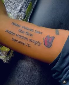 a woman's arm with a tattoo saying some women fear the fire, some women simply become it