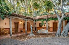 the courtyard of an old spanish style home