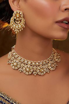 Gold necklace set, Polki necklace set, pearl embellished necklace set, best kundan jewelry, Jewelry designs, aesthetic Jewelry Dulhan SetZevar by Geeta designs this shimmery necklace rendered in gold-plated mixed metal encrusted with pearl, kundan and polki embellishments, complementing it with matching earrings. Style them with a brocade sari set and block heels for a wedding reception. Kundan Jewellery Set Necklaces, Dulhan Jewellery Set, Dulhan Set, Heels For A Wedding, Uncut Jewellery, Kundan Polki Necklace, Polki Necklace Set, Designs Aesthetic, Kundan Jewellery Set